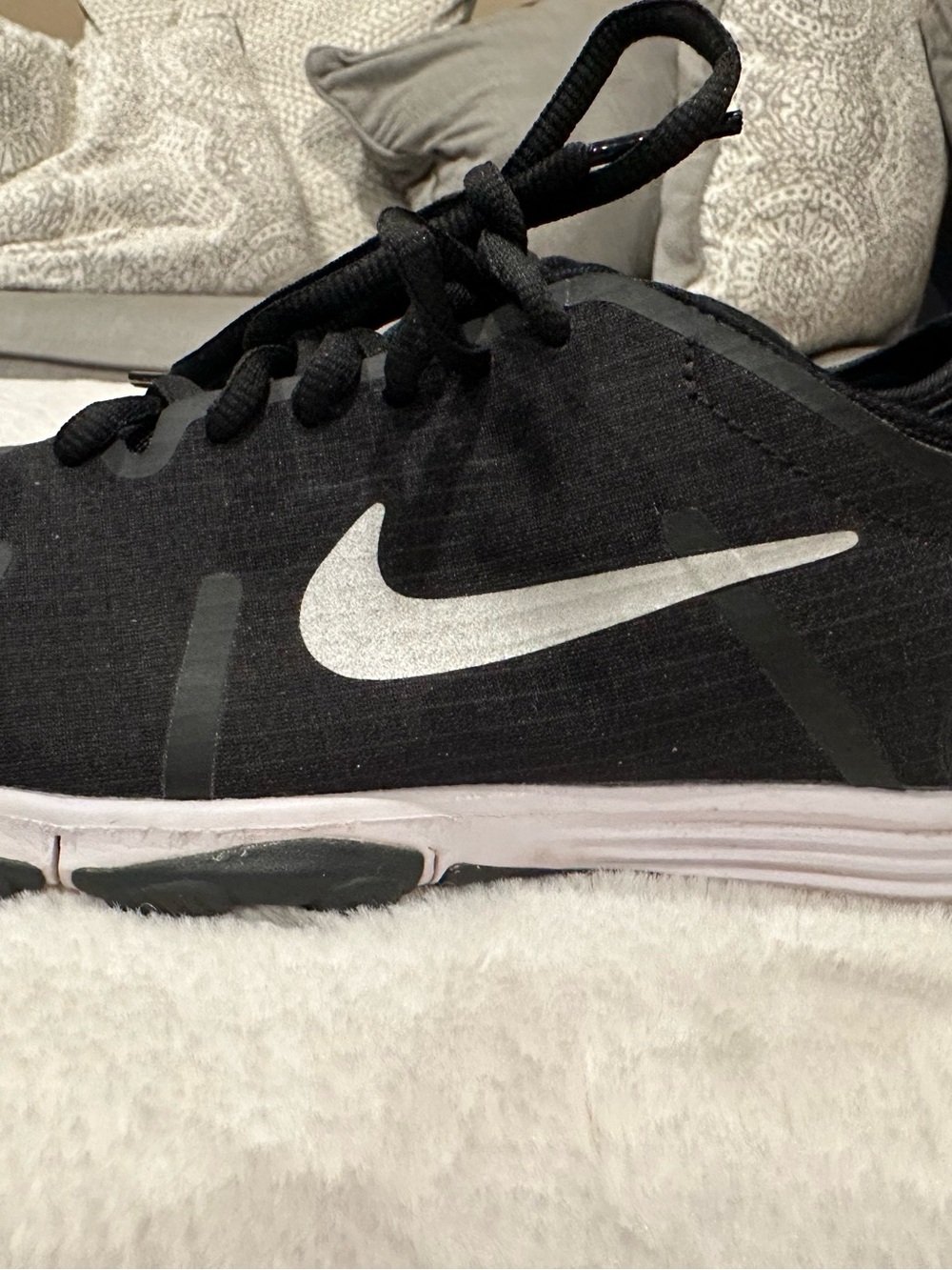 Nike Men’s Black Sneakers with White Swoosh